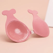 Inside of The Statement Bra cup showing the adhesive face and the clear front clasp
