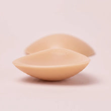 Close-up of The Sculpt Petite insert showing the tapered edge and the adhesive face