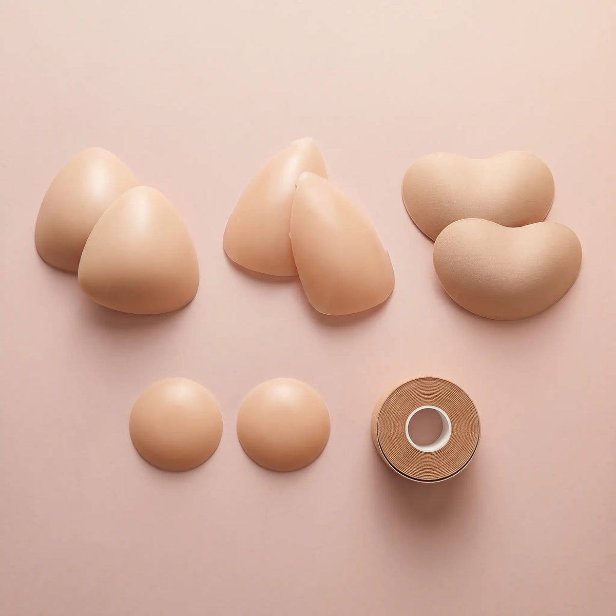 The Complete Kit flat lay - the Sculpt, the Sculpt Lite, the Sweetheart, round covers and body tape