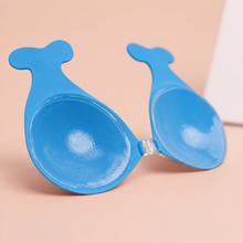 Inside of The Statement Bra cup in Indigo showing the adhesive face and the clear front clasp