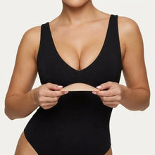 Woman holding The Sculpt Lite insert with both hands